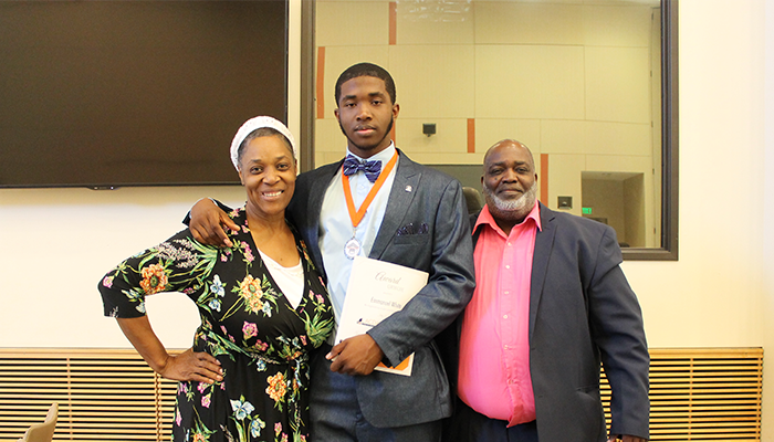 Photo of scholarship recipient with family